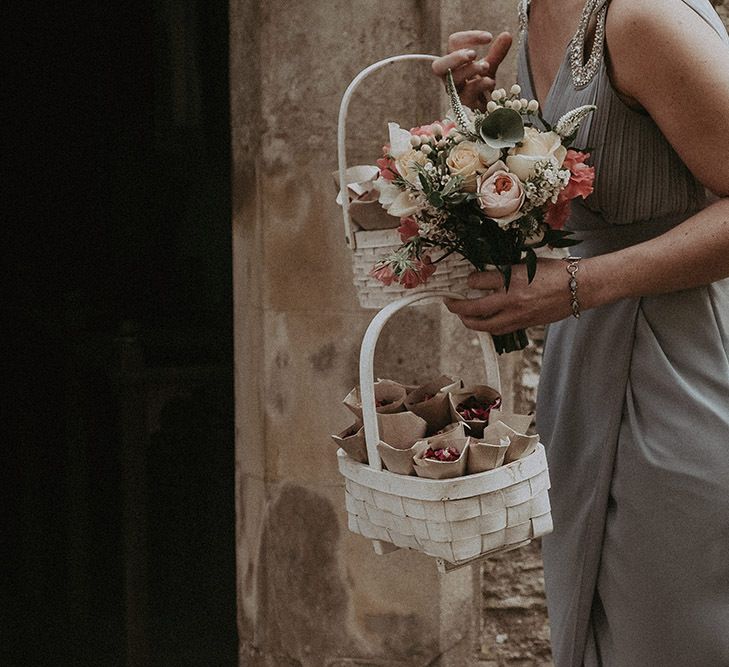 Bridesmaids Holding Wedding Bouquet and Confetti Cones in Baskets