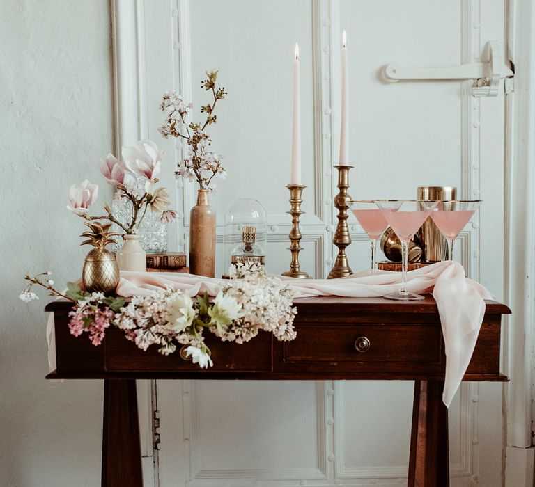 Vintage Dresser Drinks Table with Blush Pink Cocktail &amp; Flowers | Classical Springtime Romance Inspiration at Butley Priory by Brown Birds Weddings | Jess Soper Photography