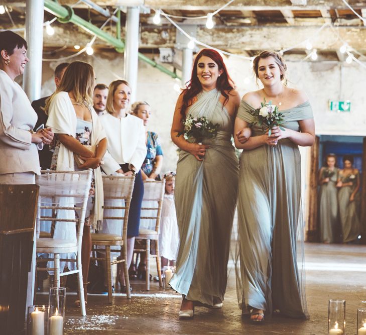 Wedding Ceremony at Holmes Mill | Bridesmaids in Fossil Green Multiway Dresses | Festoon Lights | Pillar Candles | Aisle Petals | Lace Bridal Cape Veil &amp; Fishtail Wedding Dress by Pronovias | On Love and Photography