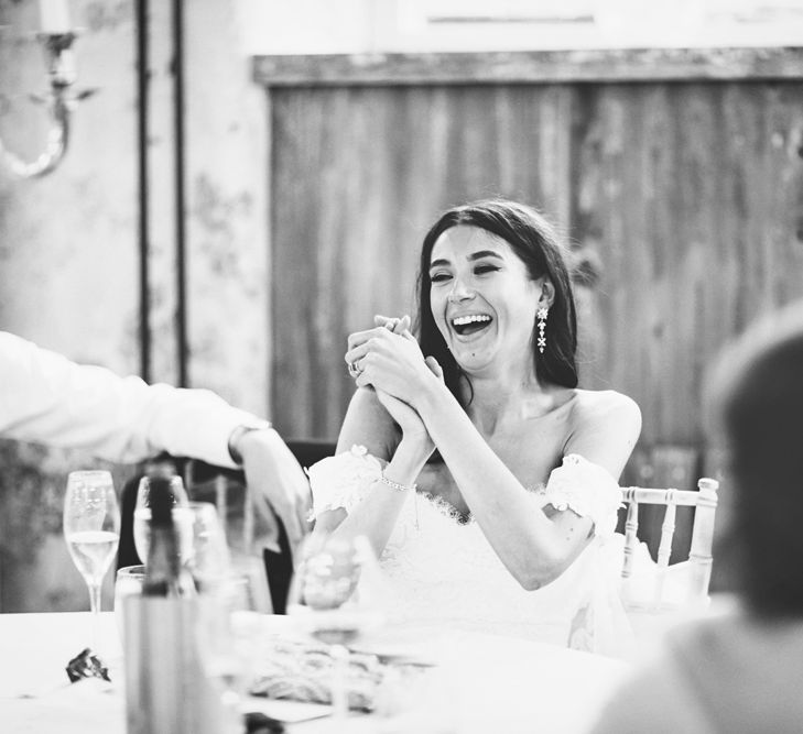 Bride in Fishtail Pronovias Wedding Dress with Off Shoulder Sleeves and Veil Cape | Bride Wearing Hair Down | Lace Bridal Cape Veil &amp; Fishtail Wedding Dress by Pronovias | On Love and Photography