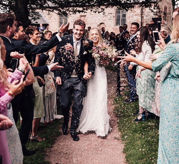 Confetti exit for bride and groom