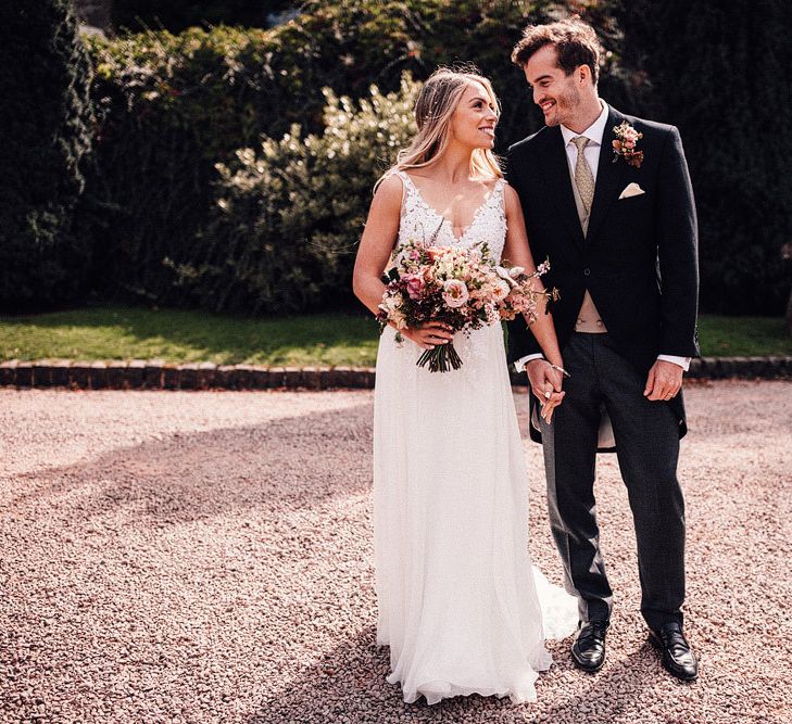 Bride and groom at Dewsall Court wedding