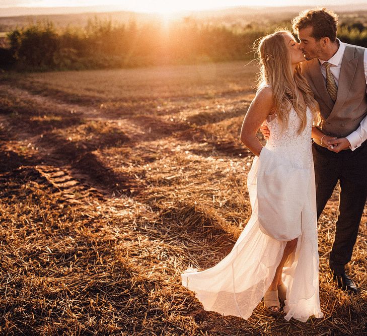 Bride and groom during summer wedding at Hereford venue