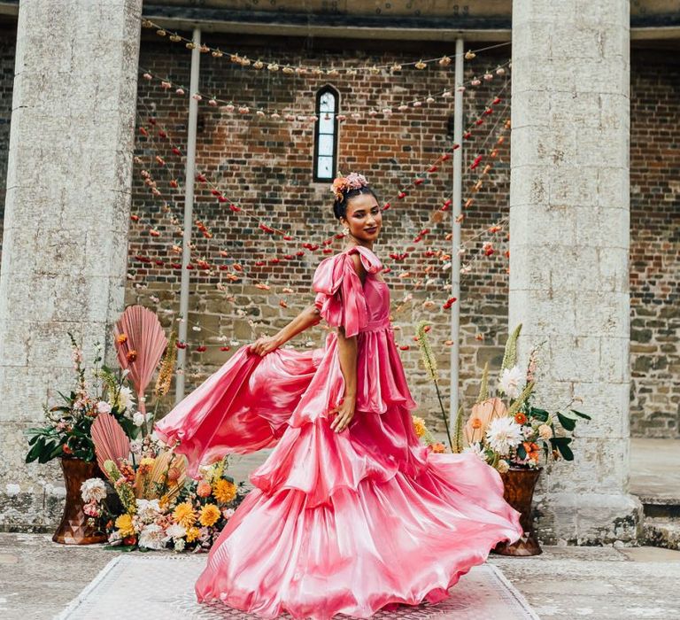 bride in layered silk Emma Beaumont wedding dress at Chiddingstone Castle