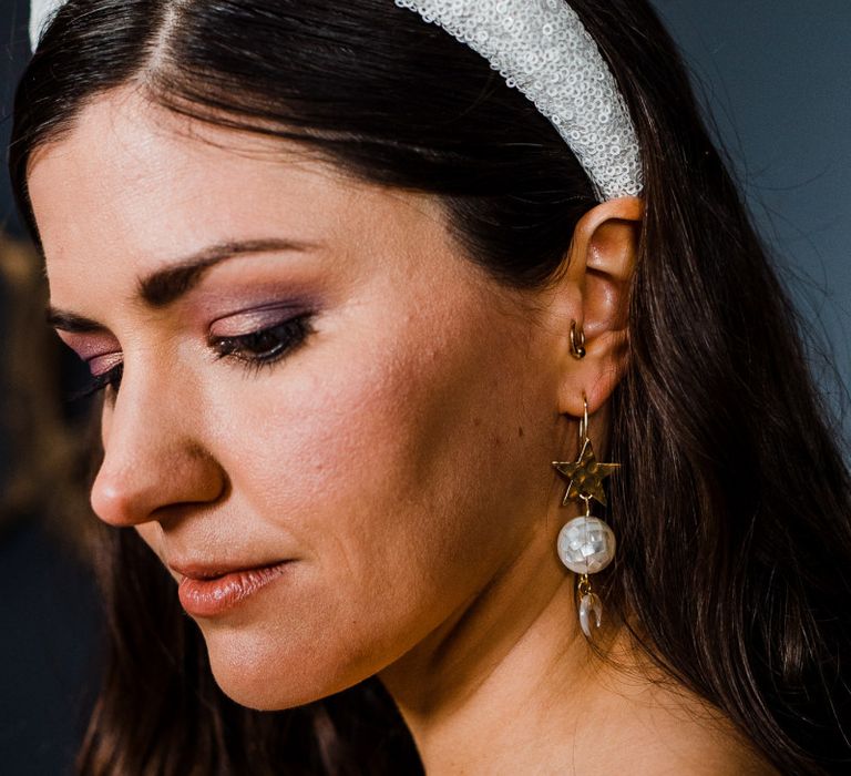 Glitter headband and dangly earrings bridal accessories