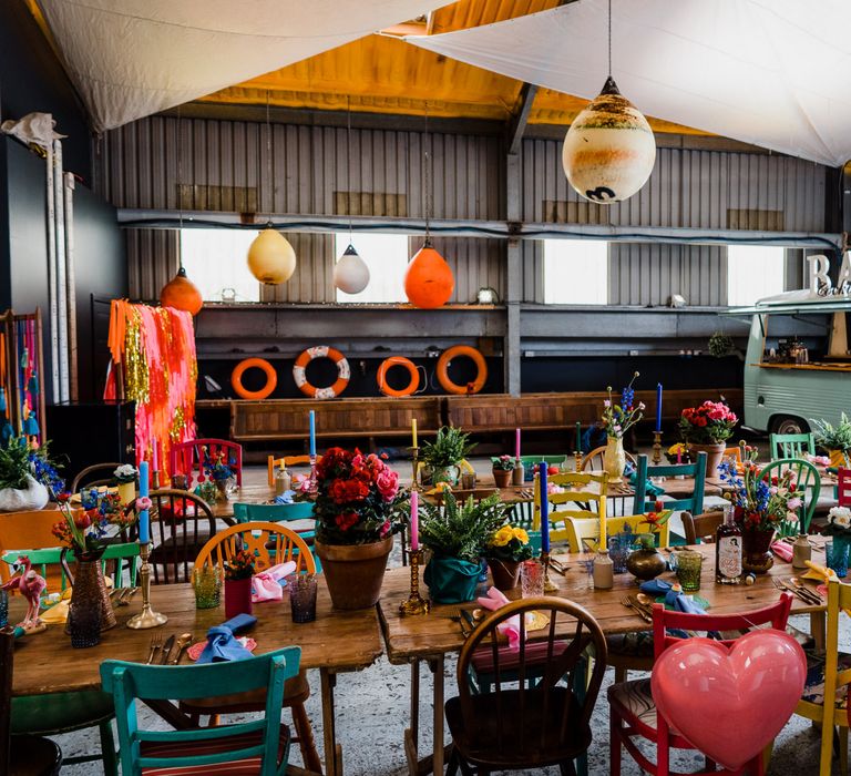 Boat shed styled reception with colourful wedding theme