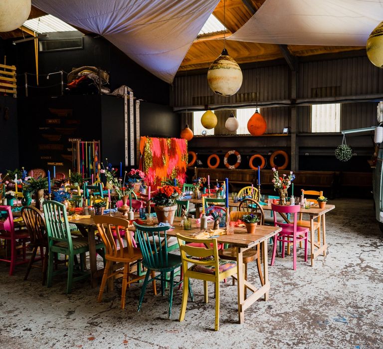 Industrial boat shed reception with colourful wedding theme