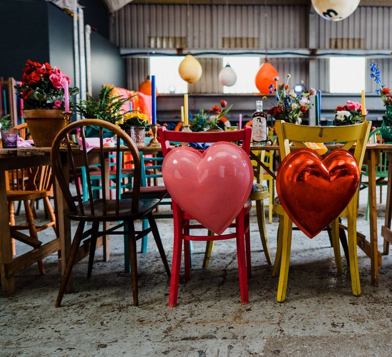 Heart chair back decor for colourful wedding theme