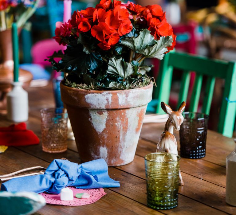 Red plant pot flower centrepiece