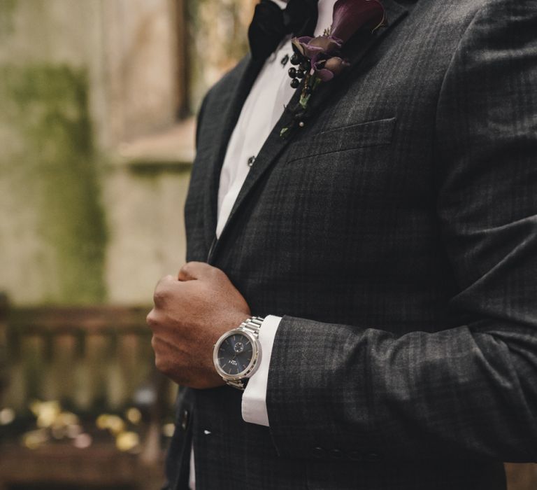 Groom in check wedding suit and Vitae watch