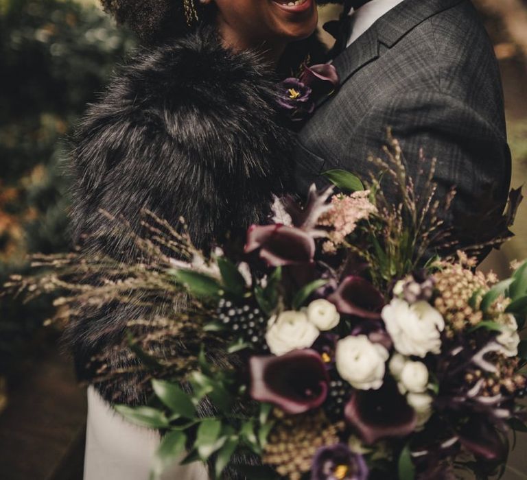 Intimate wedding photography with bride and groom laughing together