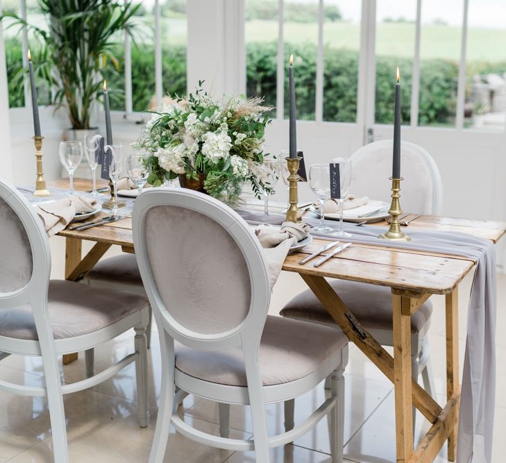 Elegant Grey and White Tablescape Decor with Taper Candles and Linen