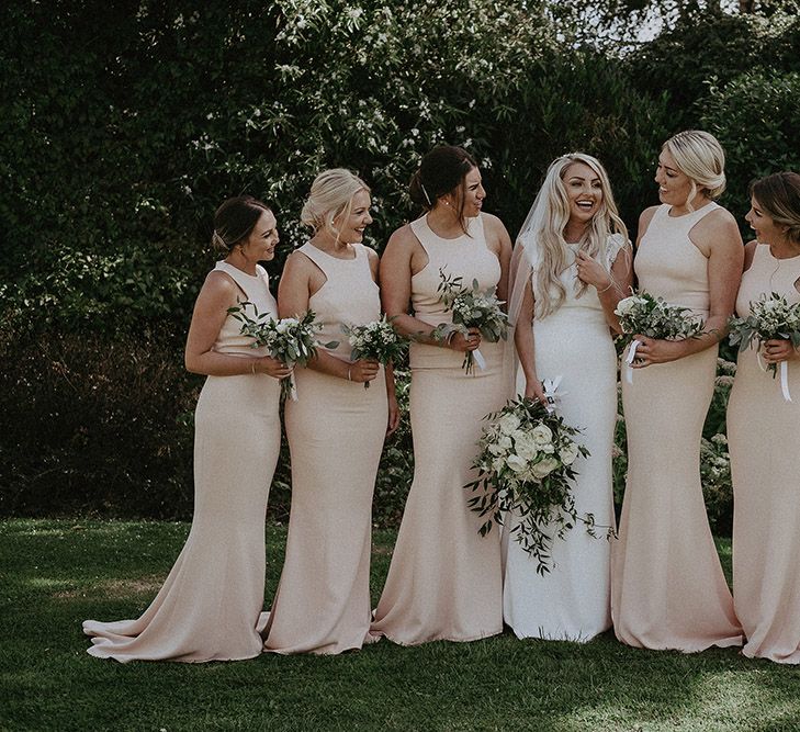 Bridal Party with Bridesmaids in Blush Pink Dresses and Bride in St Patrick Wedding Dress