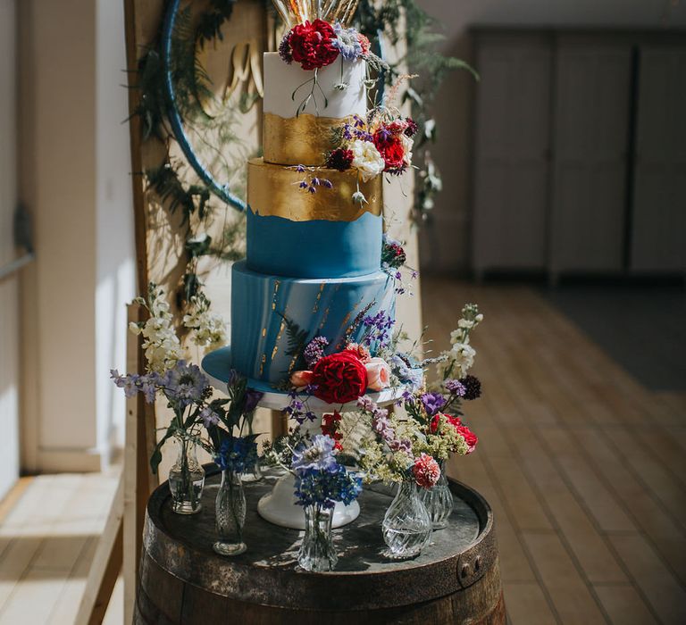 Bright Blue Wedding Cake // Vow Renewal At Doddington Hall With Bride In Alan Hannah With Brightly Coloured Florals And Images From Magda K Photography