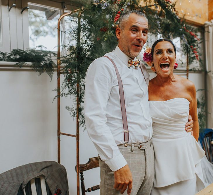 Vow Renewal At Doddington Hall With Bride In Alan Hannah With Brightly Coloured Florals And Images From Magda K Photography