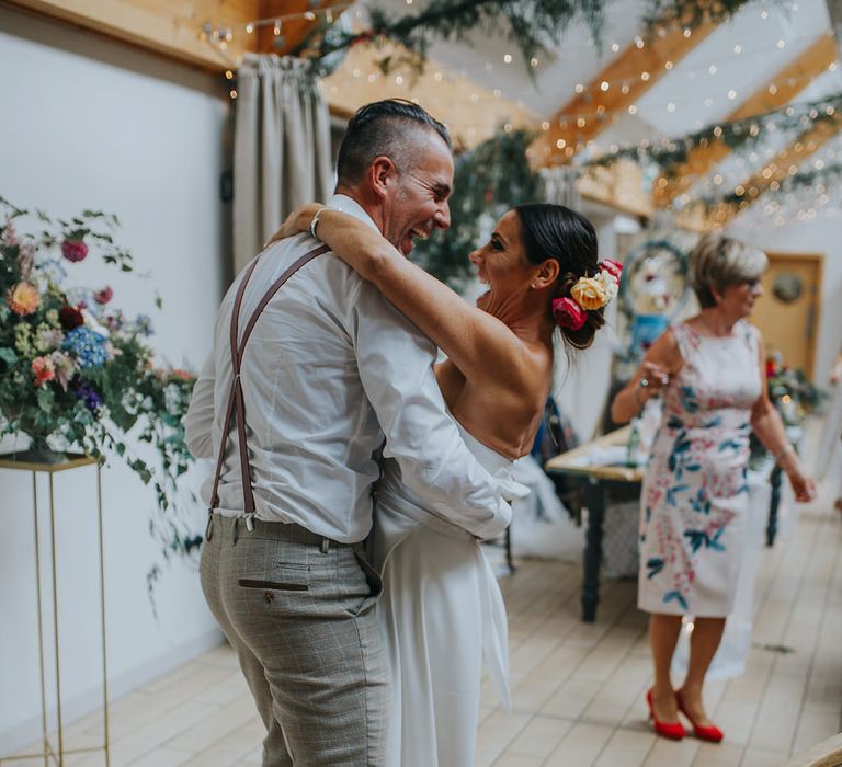 Vow Renewal At Doddington Hall With Bride In Alan Hannah With Brightly Coloured Florals And Images From Magda K Photography