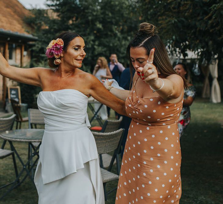 Wedding Party Conga // Vow Renewal At Doddington Hall With Bride In Alan Hannah With Brightly Coloured Florals And Images From Magda K Photography