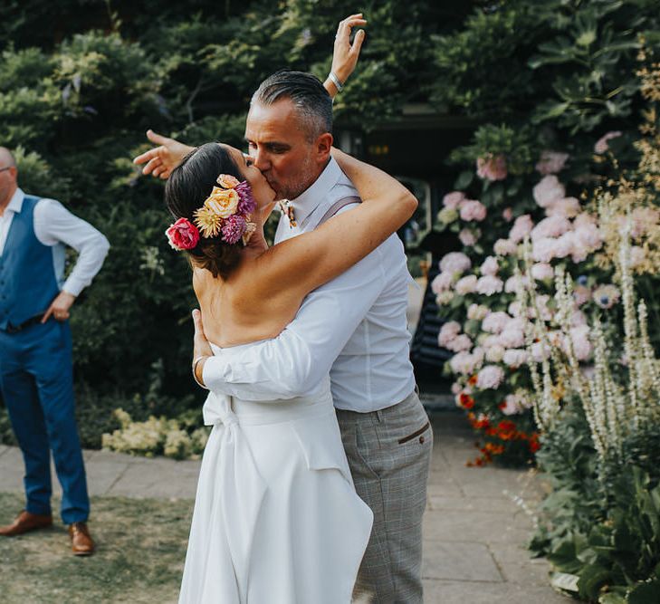 Vow Renewal At Doddington Hall With Bride In Alan Hannah With Brightly Coloured Florals And Images From Magda K Photography