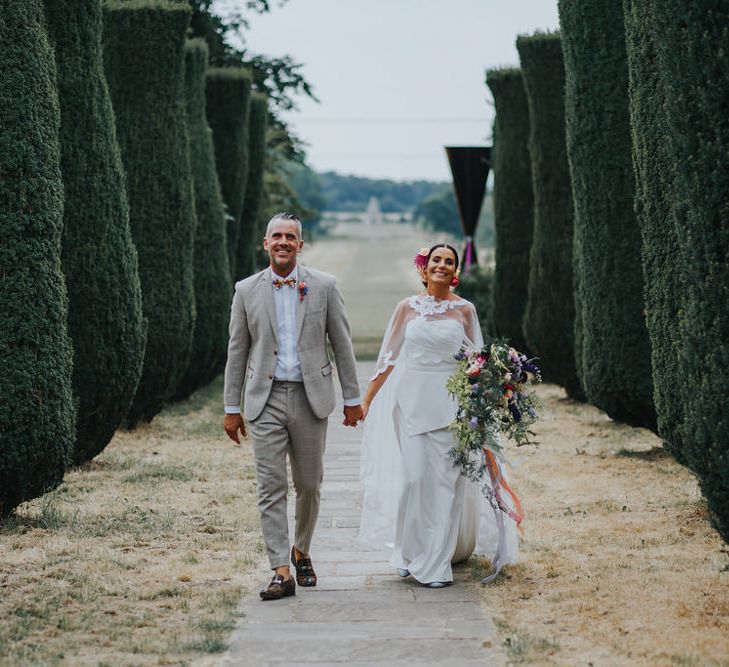 Vow Renewal At Doddington Hall With Bride In Alan Hannah With Brightly Coloured Florals And Images From Magda K Photography