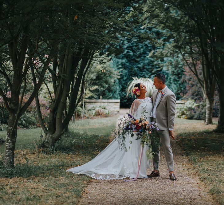 Vow Renewal At Doddington Hall With Bride In Alan Hannah With Brightly Coloured Florals And Images From Magda K Photography