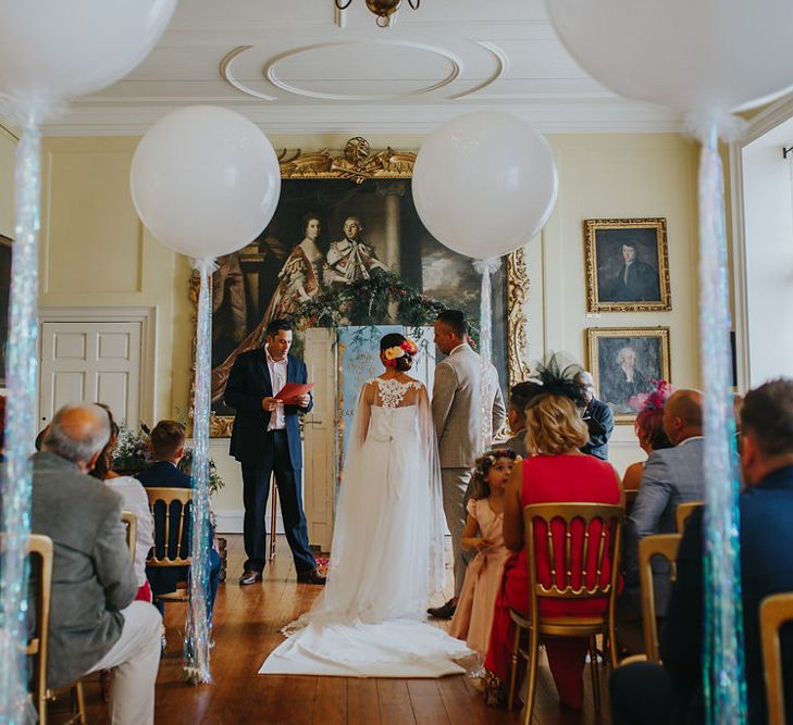 Vow Renewal At Doddington Hall With Bride In Alan Hannah With Brightly Coloured Florals And Images From Magda K Photography