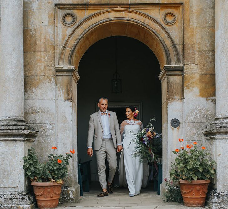 Vow Renewal At Doddington Hall With Bride In Alan Hannah With Brightly Coloured Florals And Images From Magda K Photography