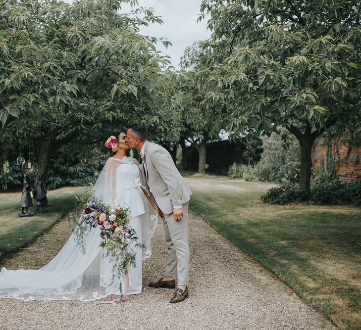 Vow Renewal At Doddington Hall With Bride In Alan Hannah With Brightly Coloured Florals And Images From Magda K Photography