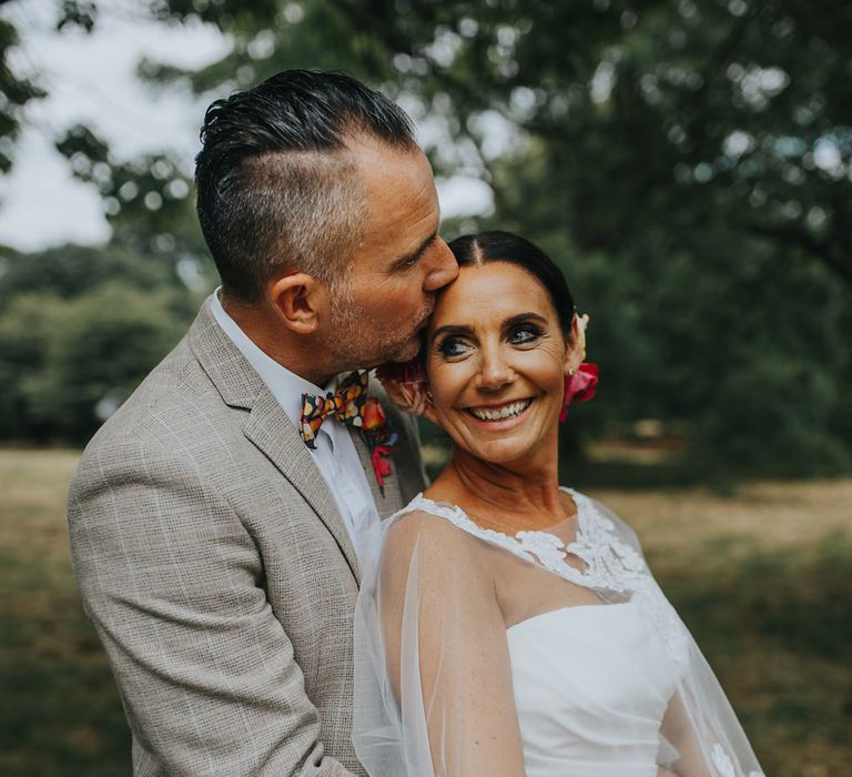 Vow Renewal At Doddington Hall With Bride In Alan Hannah With Brightly Coloured Florals And Images From Magda K Photography