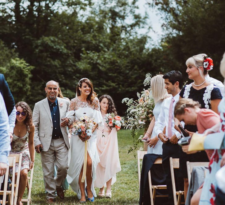 Outdoor Wedding Ceremony with Bridal Entrance in Rime Arodaky Cooper Wedding Dress