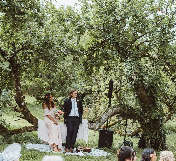 Wedding Guests Sitting in the Tress