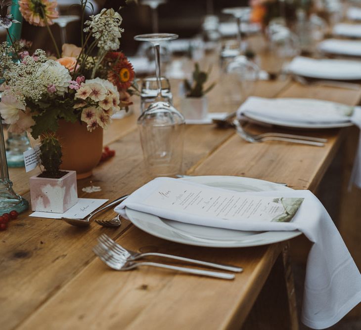 Place Setting with Linen Napkins and Menu Cards