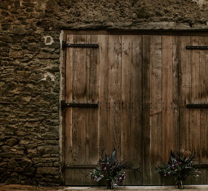 Rustic Barn Door &amp; Bouquets | Forest Green and Black Dark Decadence Wedding Inspiration in a Rustic Barn Planned &amp; Styled by Knots &amp; Kisses with Images by Daze of Glory Photography