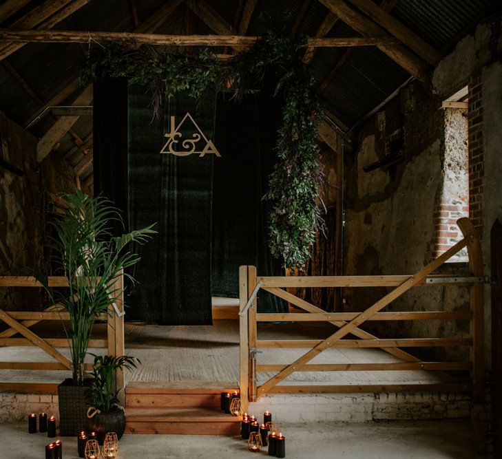 Foliage &amp; Candle Light Altar Wedding Decor | Forest Green and Black Dark Decadence Wedding Inspiration in a Rustic Barn Planned &amp; Styled by Knots &amp; Kisses with Images by Daze of Glory Photography