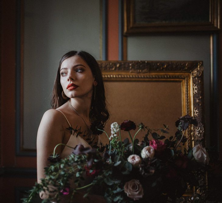 Bride in River Elliot Bridal Gown | Oversized Bridal Bouquet | Dark Opulence Inspiration at Anstey Hall, Cambridgeshire Styled by Mia Sylvia | Camilla Andrea Photography