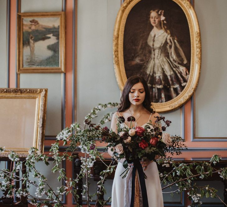 Bride in River Elliot Bridal Gown | Oversized Bridal Bouquet | Dark Opulence Inspiration at Anstey Hall, Cambridgeshire Styled by Mia Sylvia | Camilla Andrea Photography