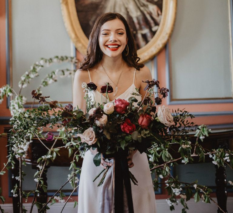 Bride in River Elliot Bridal Gown | Oversized Bridal Bouquet | Dark Opulence Inspiration at Anstey Hall, Cambridgeshire Styled by Mia Sylvia | Camilla Andrea Photography