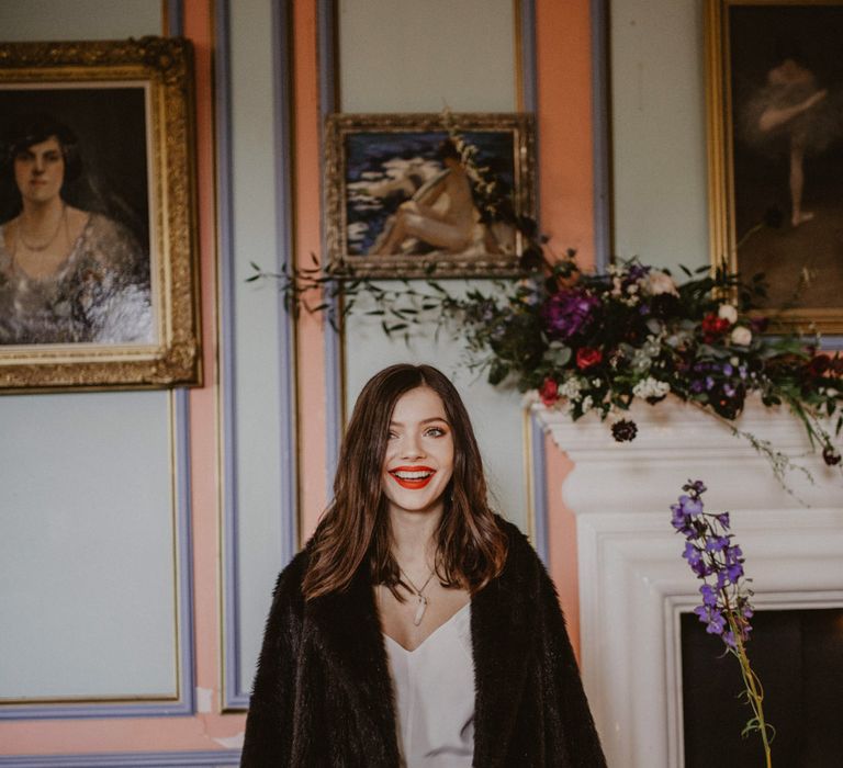 Bride in River Elliot Bridal Gown and Fur Coat | Tablescape with Candlesticks  | Dark Opulence Inspiration at Anstey Hall, Cambridgeshire Styled by Mia Sylvia | Camilla Andrea Photography