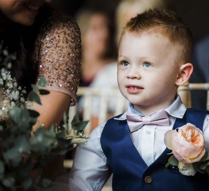 Page Boy in Navy Waistcoat and Rose Buttonhole