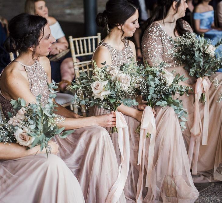 Bridesmaids in Blush Pink Sequins and Tulle Maya Dresses Sitting at the Wedding Ceremony