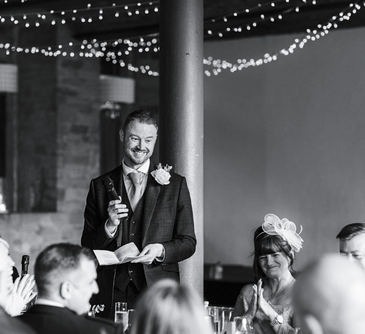 Wedding Reception Grooms Speech with Hanging Lights