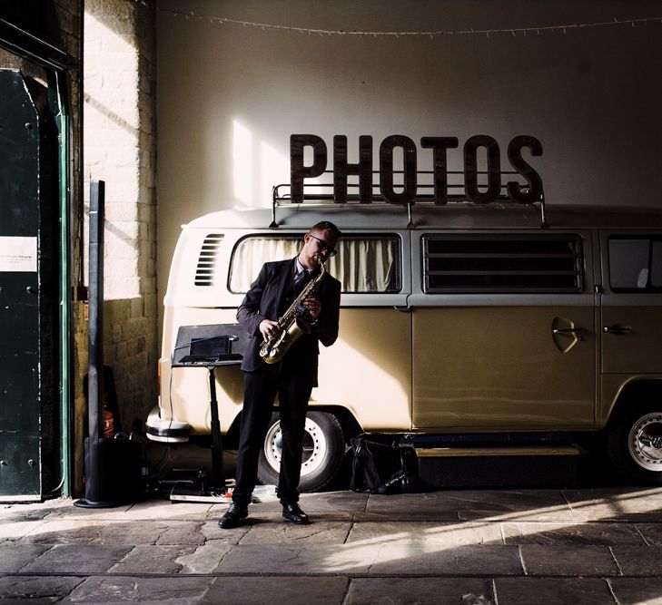 Saxophonist Standing in Front of VW Camper Van Photo Booth