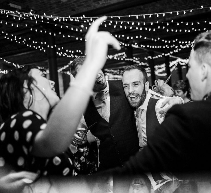 Two Grooms on the Fairy Light Covered Dance Floor