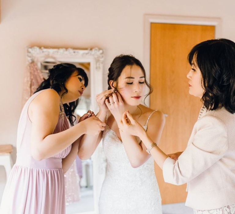 Bride and her bridal party getting ready for the ceremony