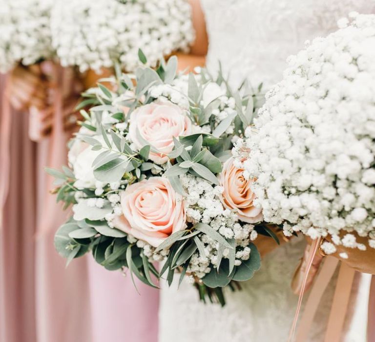 Dusky pink rose bridal bouquet with gypsophila bridesmaid bouquets