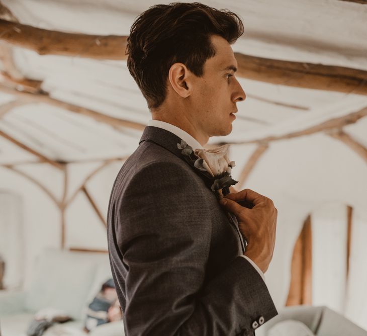 Groom in Light Blue Two-Piece Suit by Hugo Boss | Blush Pink Buttonhole | Yurt Wedding with Outdoor Naked Tipi Ceremony, Glitter Station &amp; Peach Rewritten Bridesmaid Dresses | Nesta Lloyd Photography