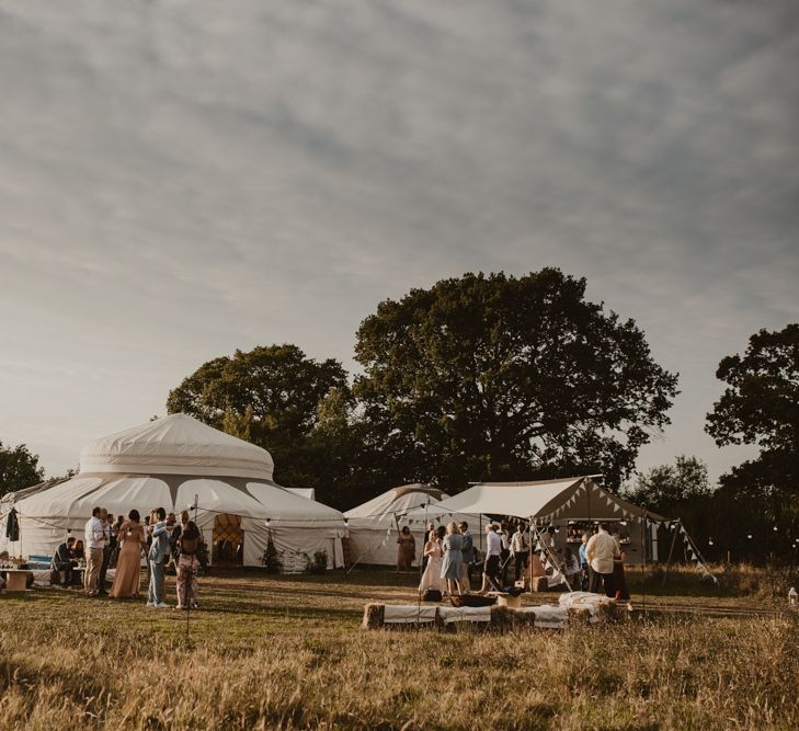 Yurt Wedding Reception at Sychpwll Centre in Wales | Yurt Wedding with Outdoor Naked Tipi Ceremony, Glitter Station &amp; Peach Rewritten Bridesmaid Dresses | Nesta Lloyd Photography