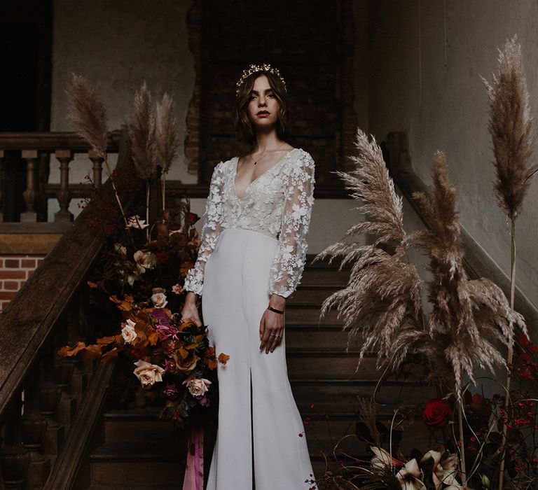 Bride in Lace Long Sleeve Bodice &amp; Fitted Skirt With Slit Bridal Gown | Floral Design by Jenni Bloom Flowers | Deep Florals Wedding Inspiration at The Grange at Northington Planned &amp; Styled by Wed &amp; Bash | Sara Lincoln Photography