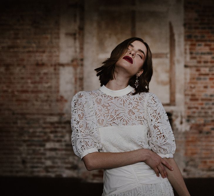 Bride in Cap Sleeve &amp; High Neck Lace Bridal Gown | Deep Florals Wedding Inspiration at The Grange at Northington Planned &amp; Styled by Wed &amp; Bash | Sara Lincoln Photography