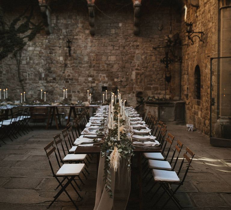 Ivory Tapered Candles With Foliage Runner And Grey Linen Napkins // Image By James Frost Photography