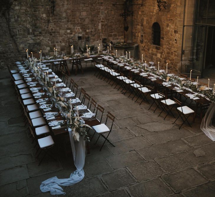 Ivory Tapered Candles With Foliage Runner And Grey Linen Napkins // Image By James Frost Photography